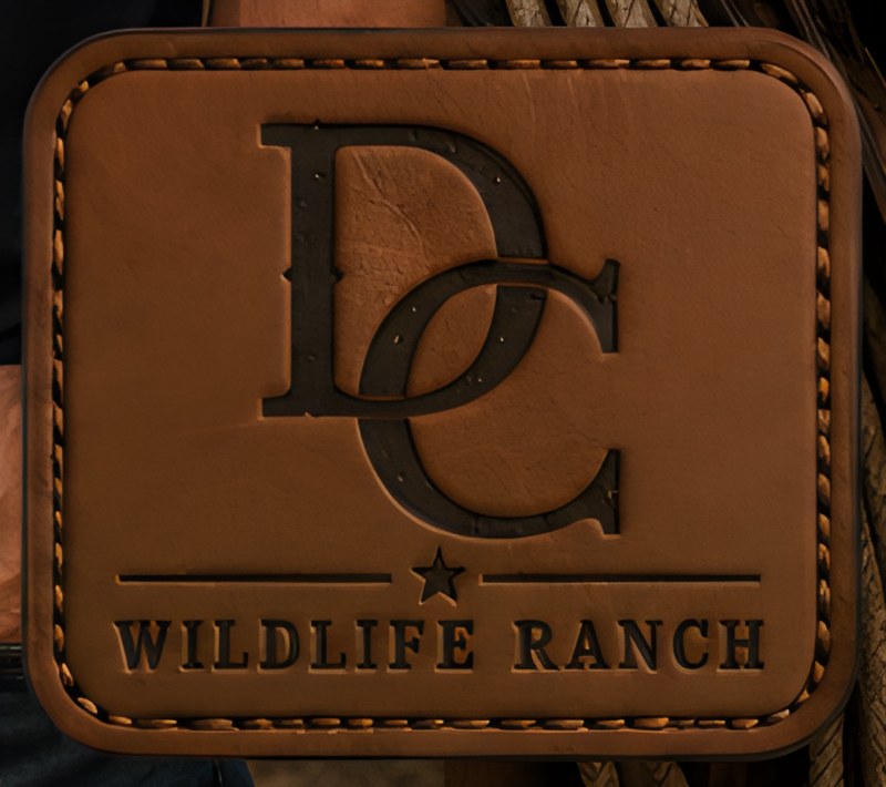 Embossed Double Creek leather patch, DC crest stamped in saddle leather